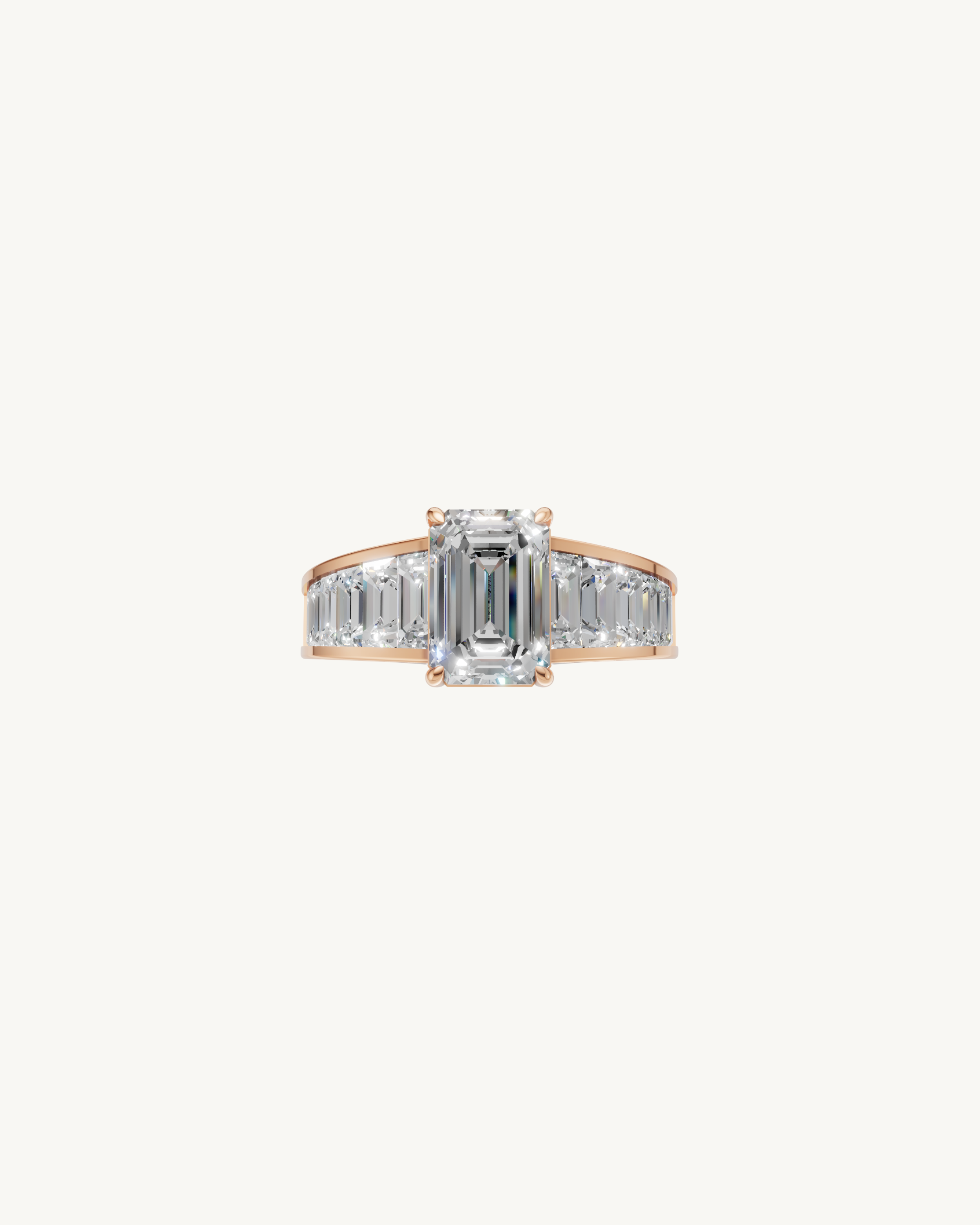 Diamond ring with a central emerald-cut diamond and baguette side stones on a white background