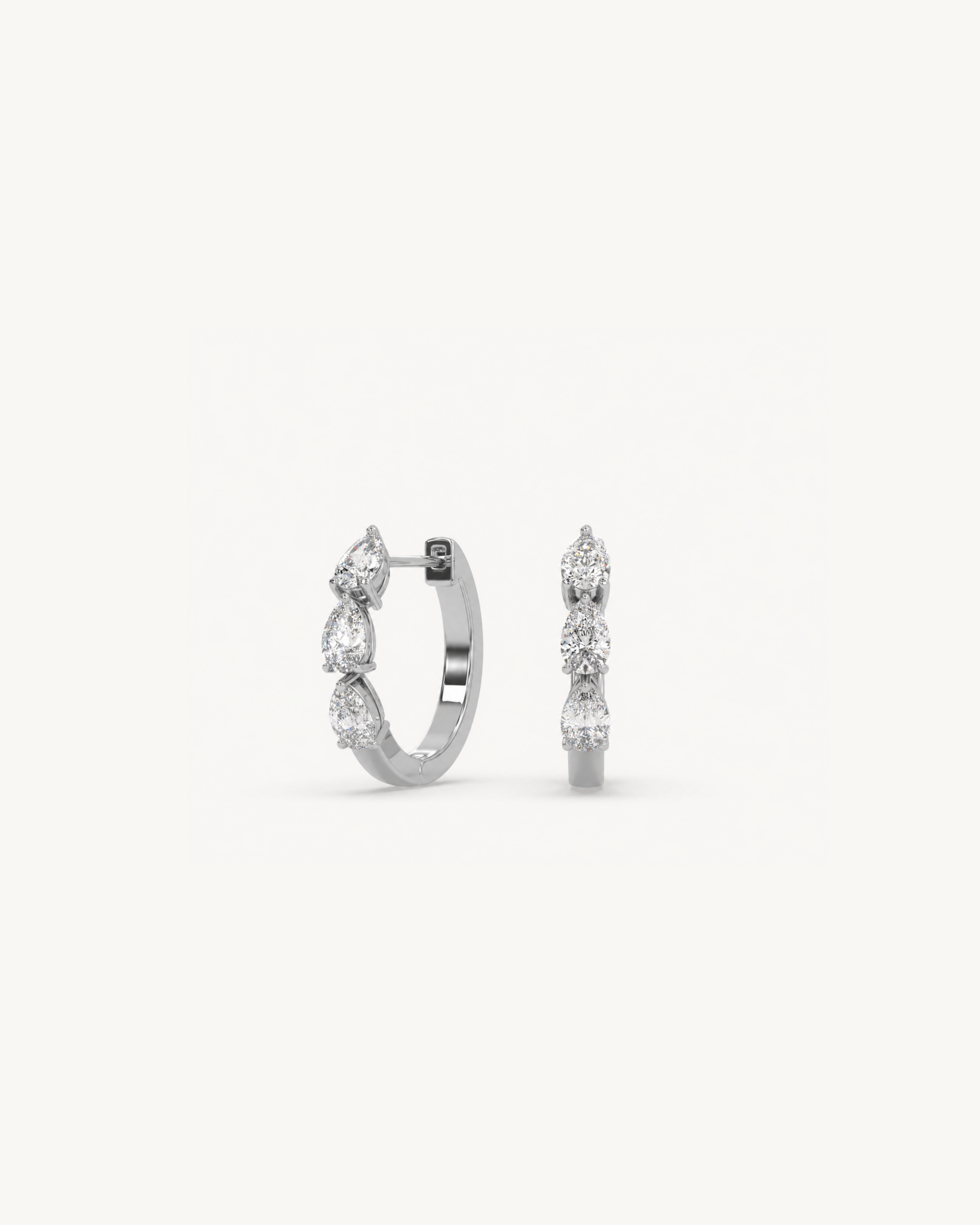 diamond hoop earrings with pear shaped diamonds